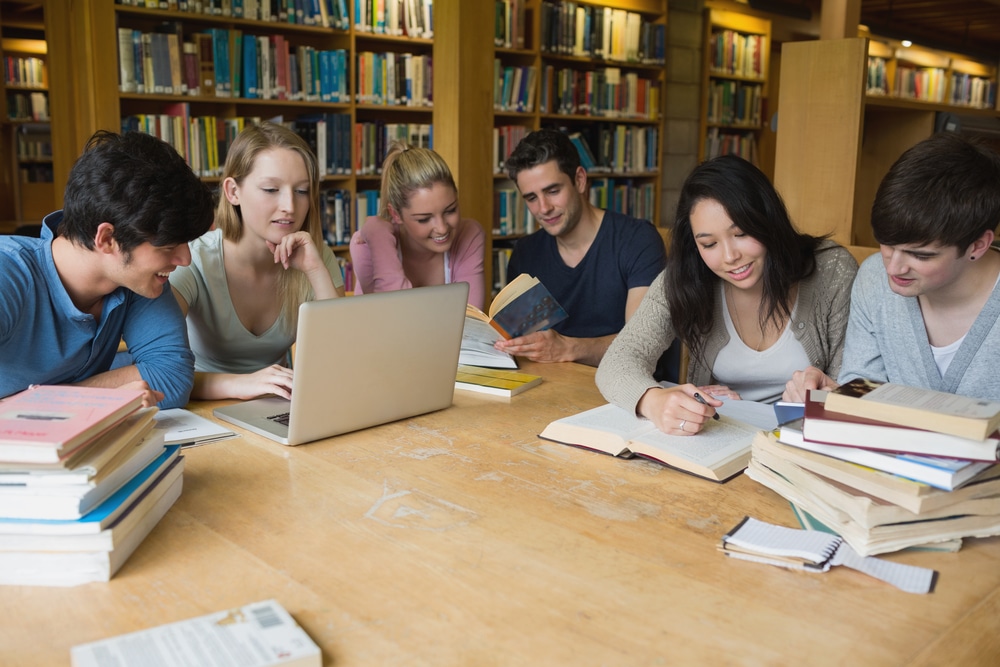 Students sitting at a table collaborating
