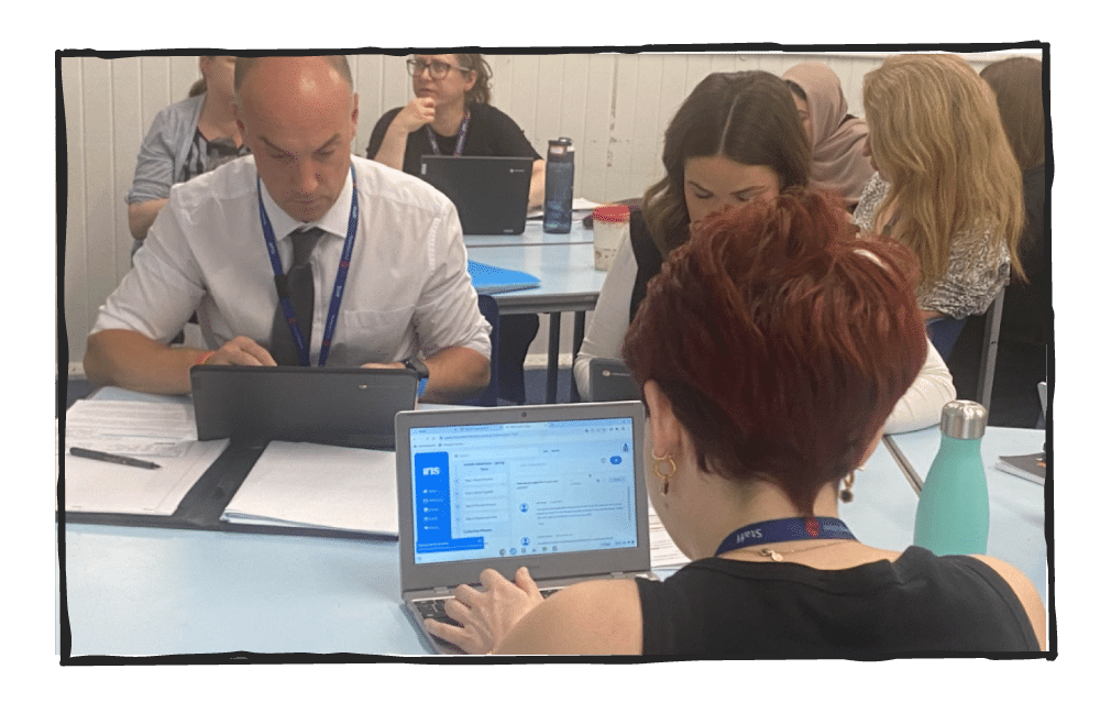 Room full of teachers collaborating